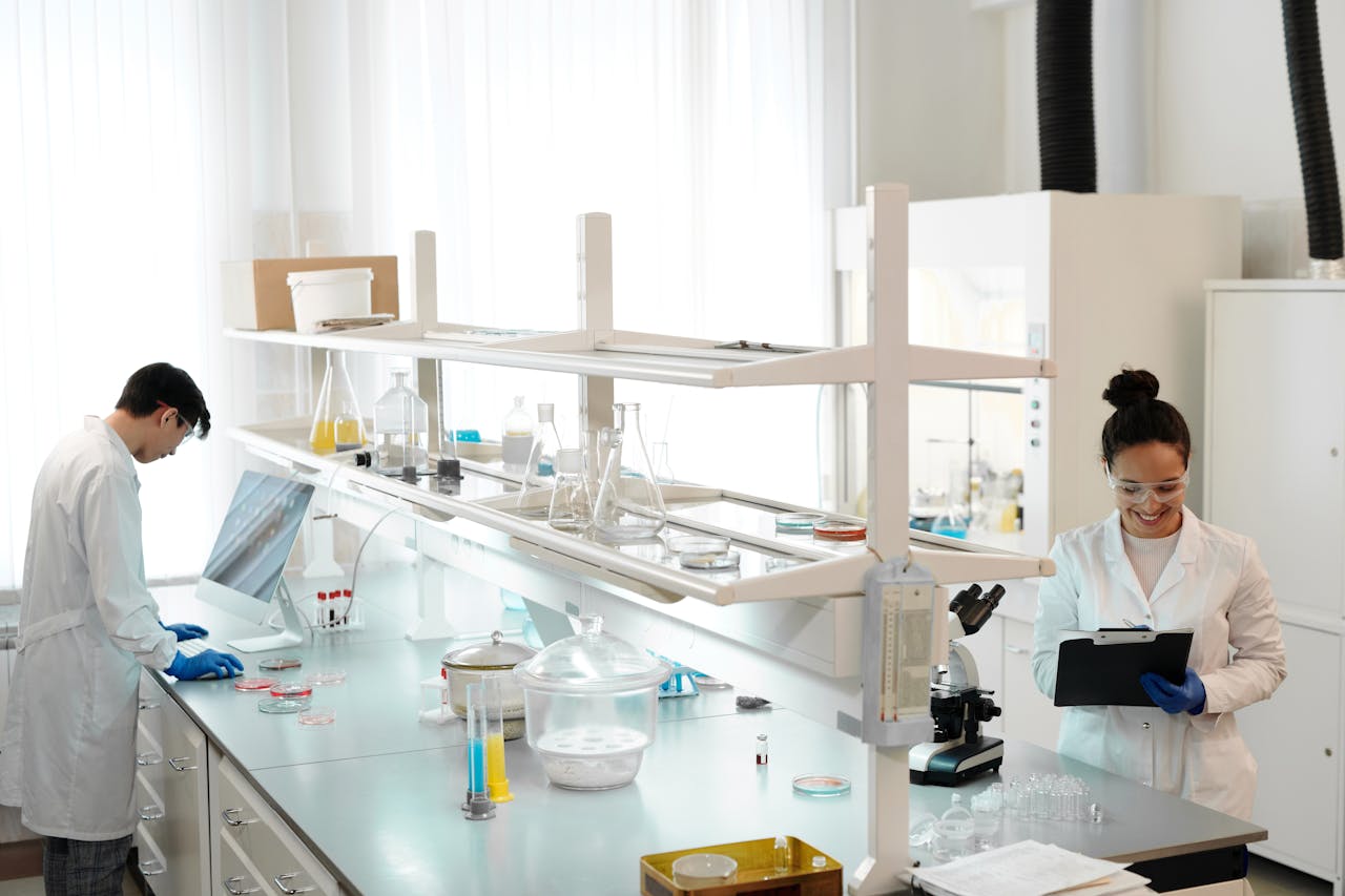 Two Scientists Working Inside the Laboratory